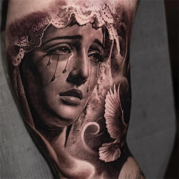 Virgin Mary Crying Tattoo