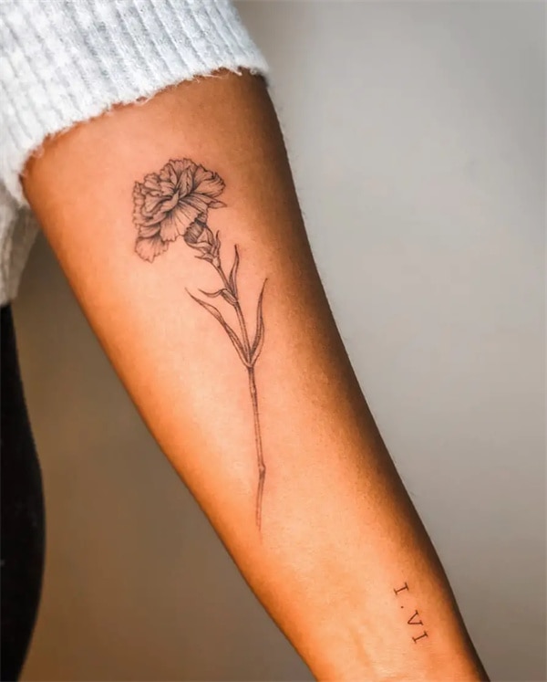 Carnation wrist tattoo